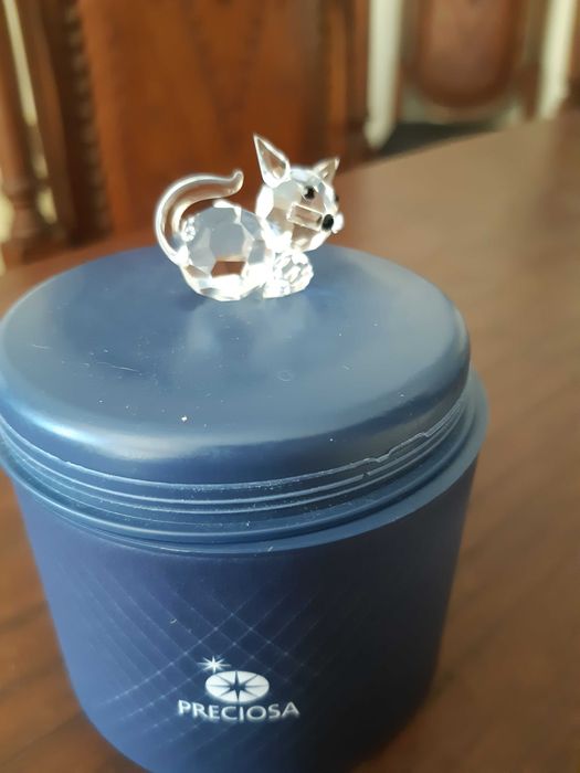 animal de cristal com caixa