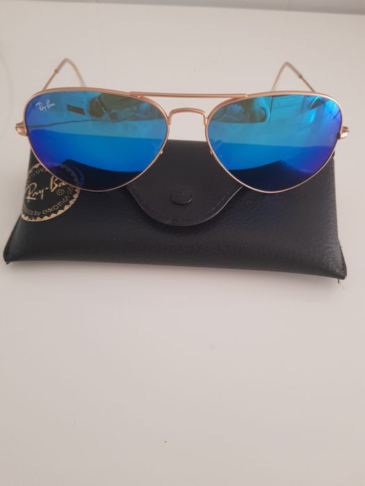 Óculos azuis dourados Ray-Ban novos sem etiqueta.