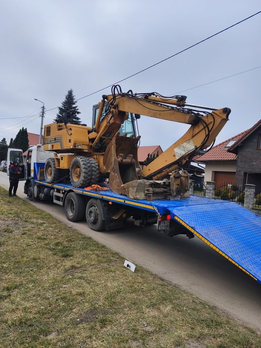 Usługi Koparką kolowa oraz koparko-ladowarka pracę ziemne oczyszcalnie