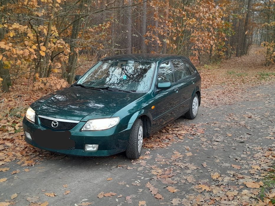 Zagłówek Mazda 323f