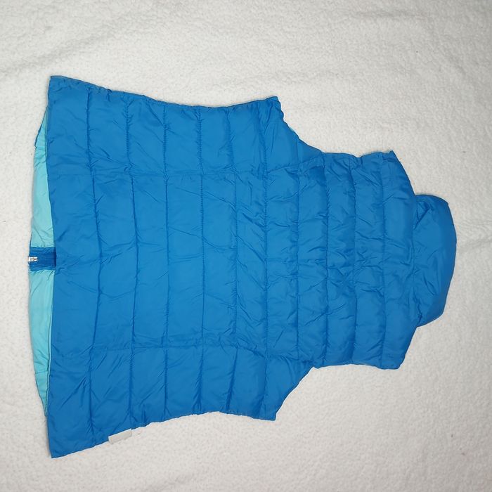 Жилетка на пуху,теплая