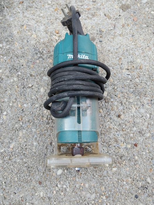 Tupia de bancada ou manual makita