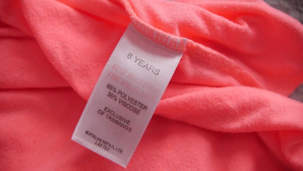 Spodenki z pomponami neonowe Matalan 8 lat 128-134 cm.