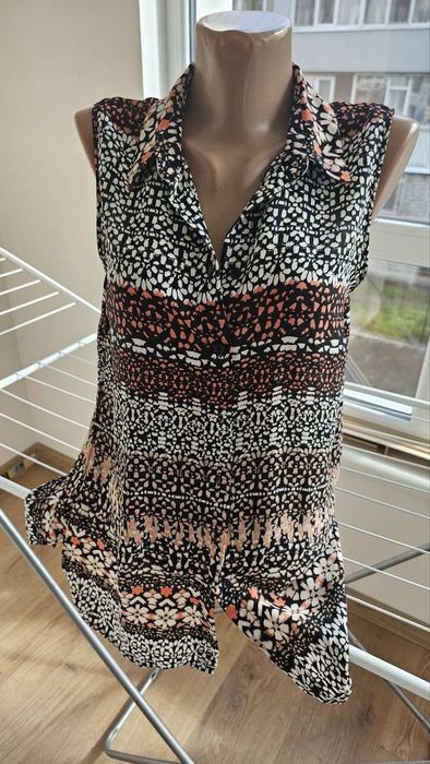 Блузи            .