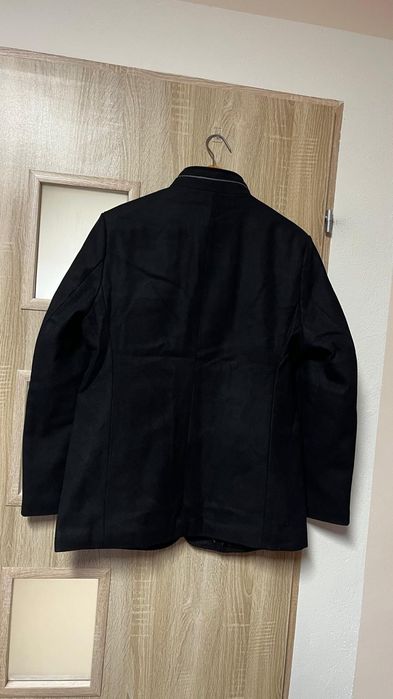 Płaszcz męski ze stójką.