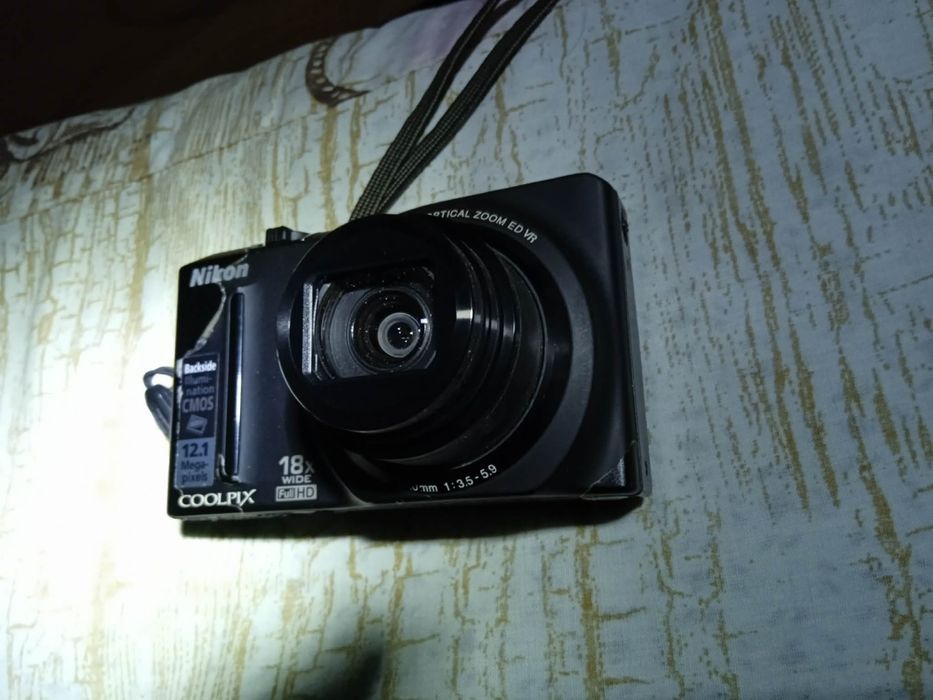 Фотоапарат Nikon  Coolpix S9100 стан гарний є зарядне