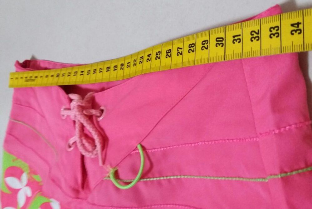 Calções marca Adidas para menina (12 anos)