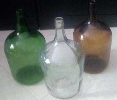Garrafões de vidro de cinco litros