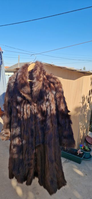 Casaco vizon em bom estado de conservação