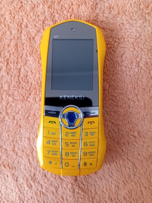 Кнопочный телефон Keneksi м5