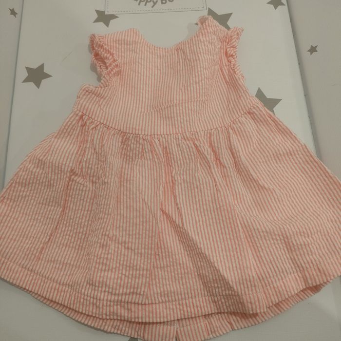 Vestido e calção - In Extenso.