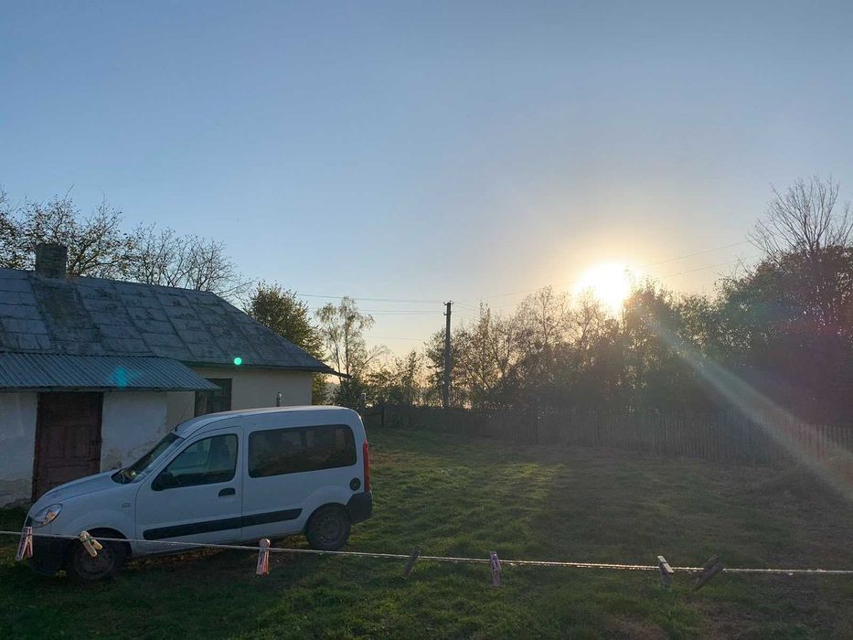 житловий будинок та земельна ділянка 46,5 сот