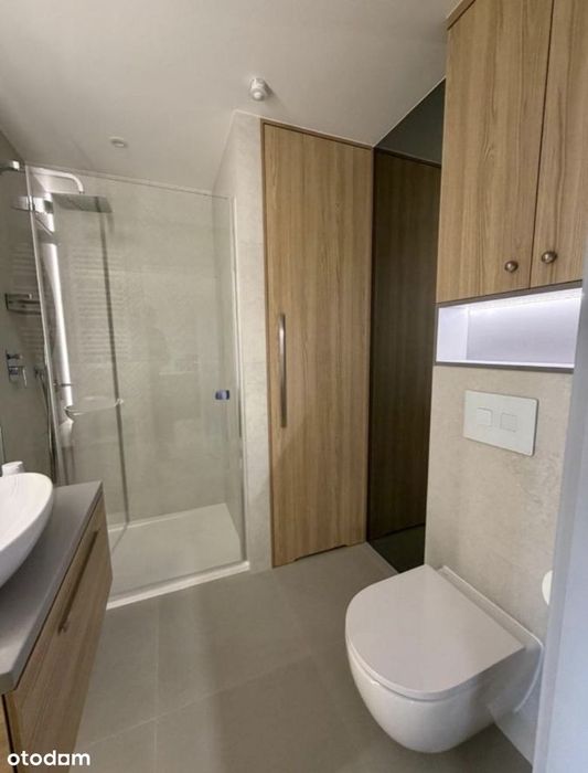 Apartament koło Mrągowa przy stoku narciarskim z widokiem na jezioro