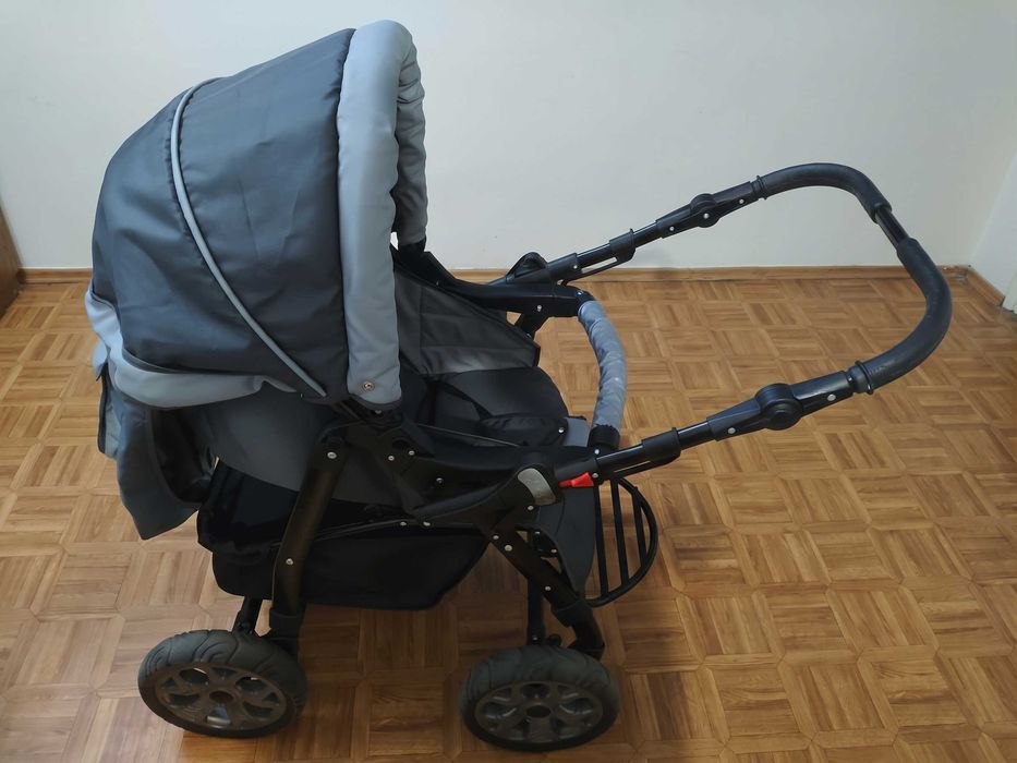 Продам дитячу прогулянкову візочок (коляску) сірого кольору / у чудовому стані