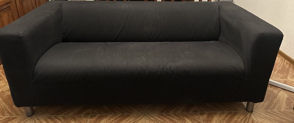 White sofa with black cover