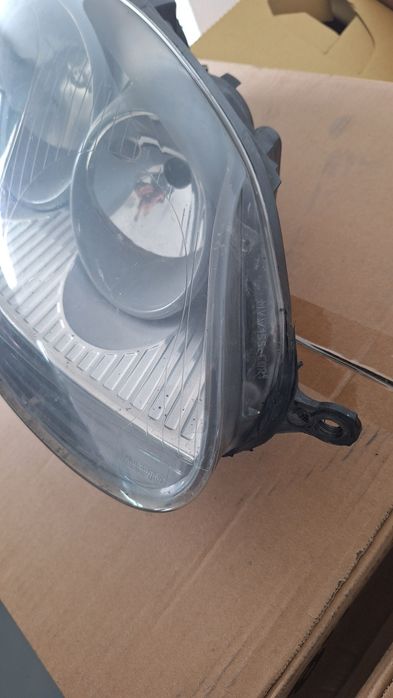 Farol frente golf 5