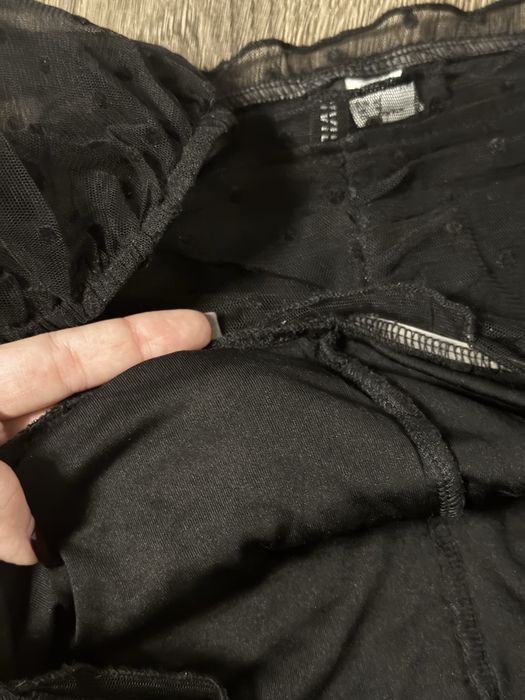 Чорний топ H&M.