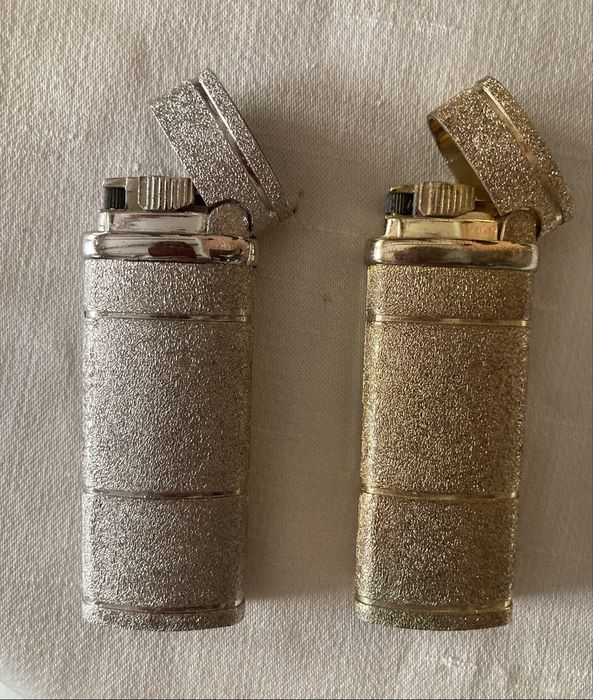 Par de Isqueiros YSL -Yves Saint Laurent- dourado e prateado