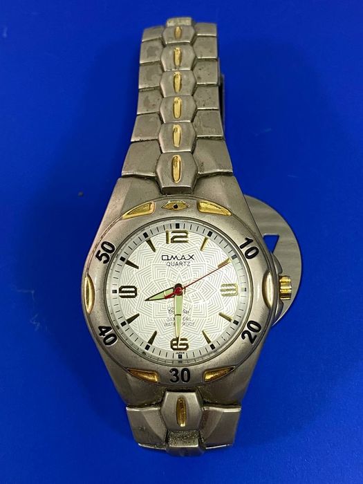 Часы Omax Quartz Crystal "50 m" Japan