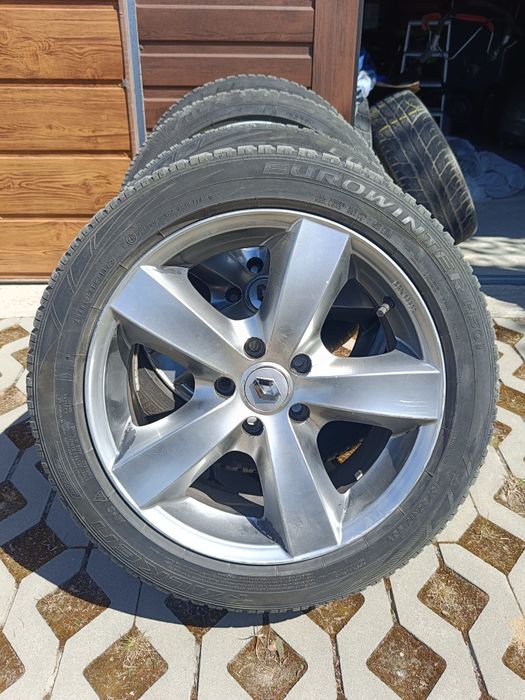 Felgi aluminiowe Dezent z oponami Falken Eurowinter