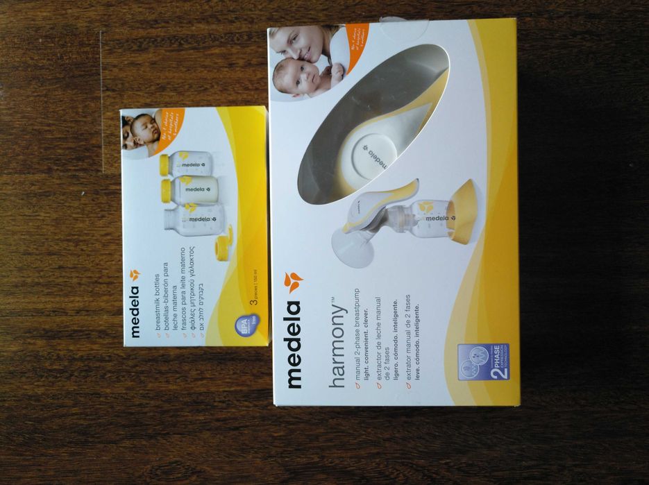 Bomba tira leite manual  e cx de 3 frascos da medela