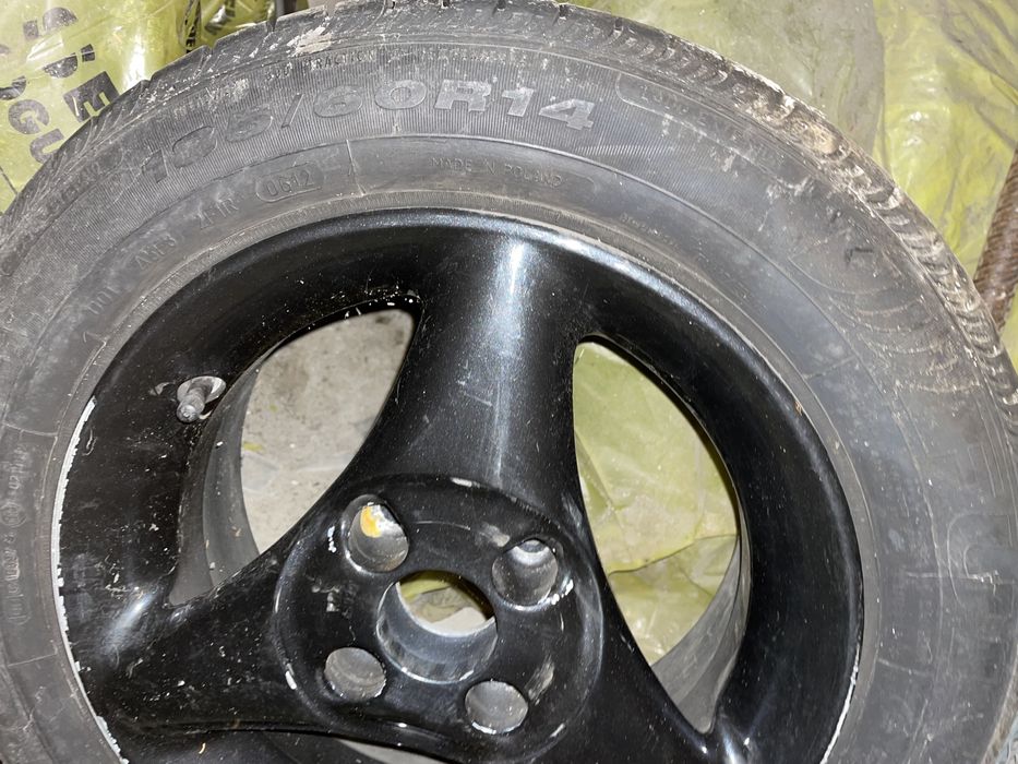 Felgi aluminiowe z oponami letnimi 4 szt 185/60 R14 Volkswagen