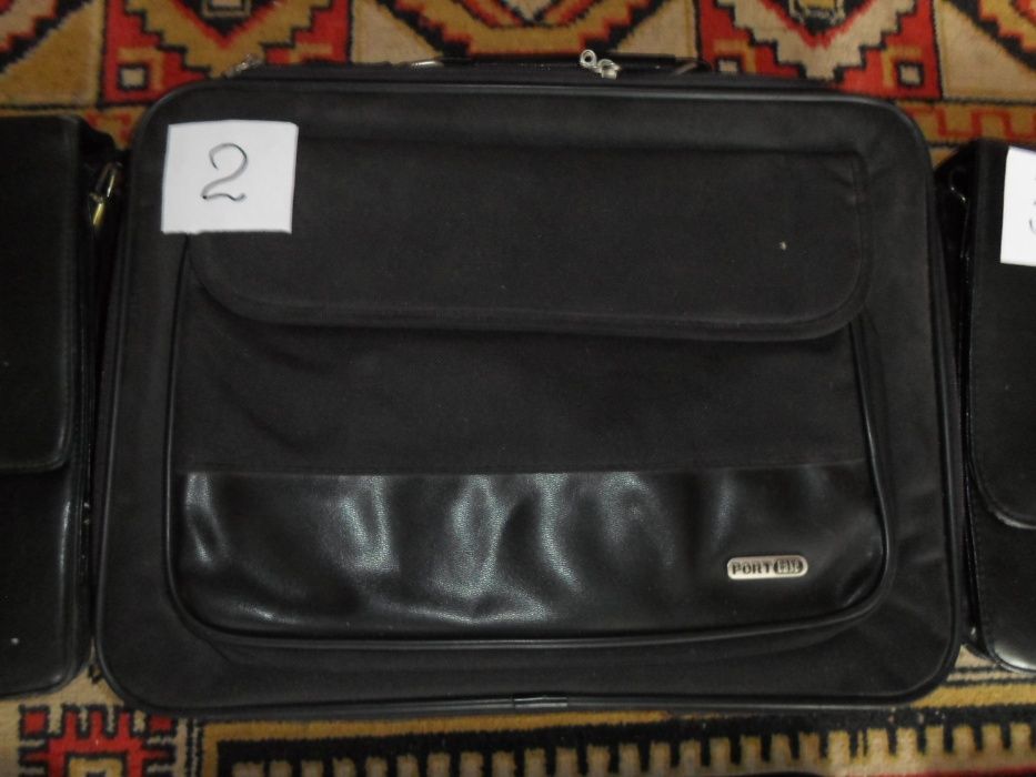 Портфели, сумки, папки из кожи и кож. зама.