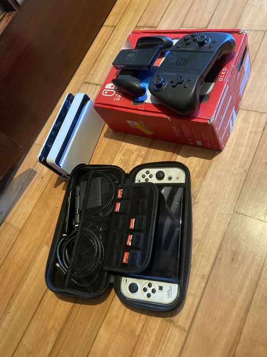 Nintendo Switch oled cinco jogos cartão de memória 256 gigas e mais um controle profissional