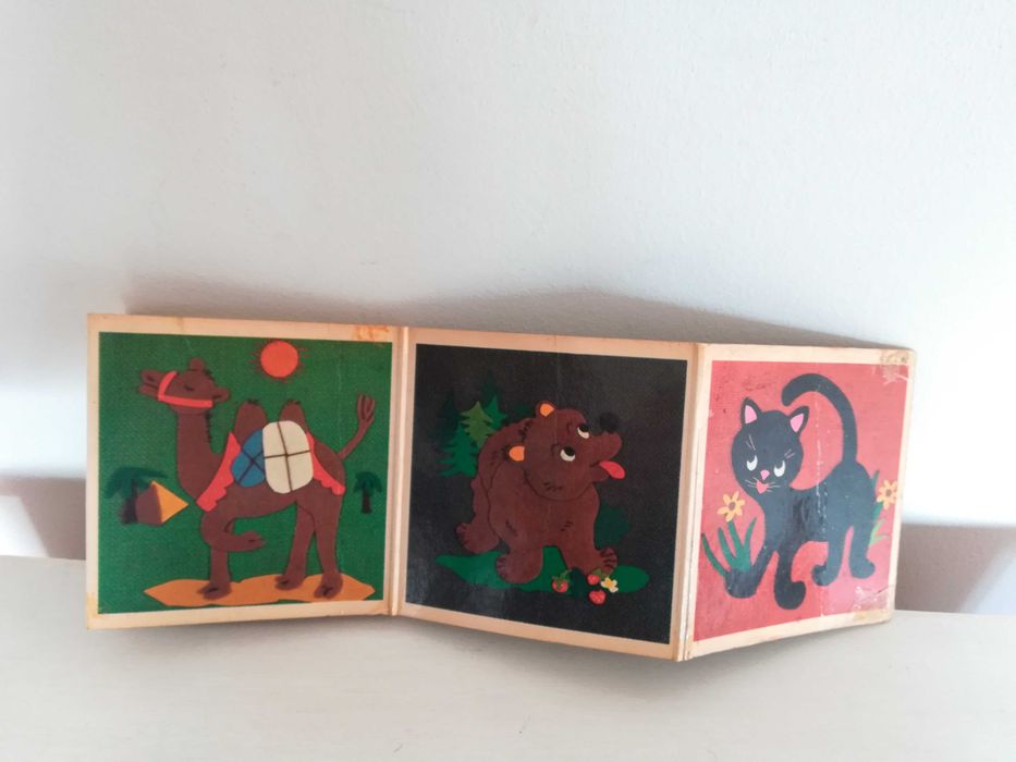 Brinquedo antigo serpentina com animais