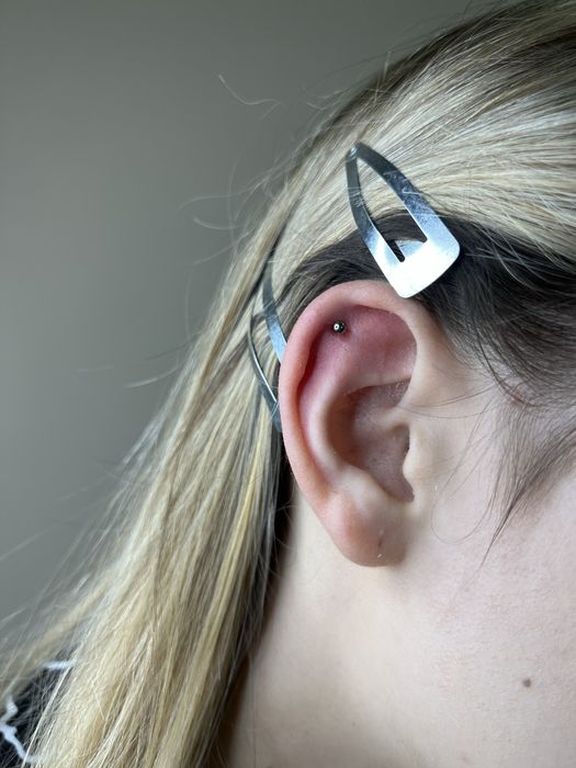 Пірсинг пістолетом та голкою