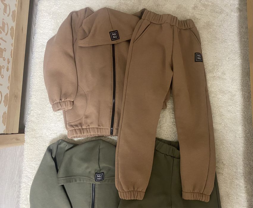 Dwa ocieplane dresy NuNu 128/134 stan idealny