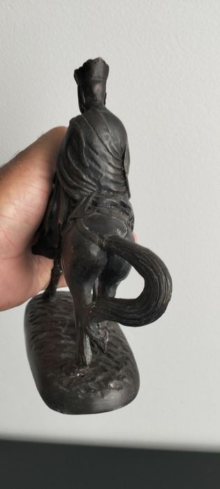 Escultura em bronze