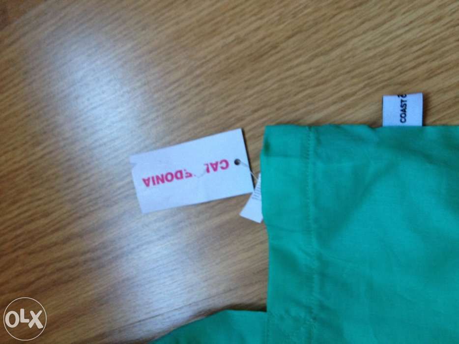 Sacos novos de praia com etiqueta.