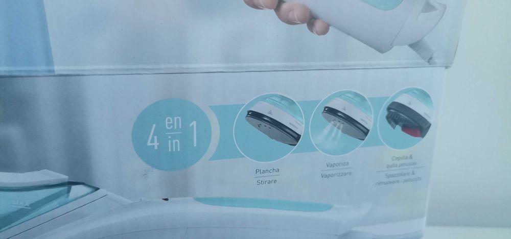 Ferro de engomar em pé