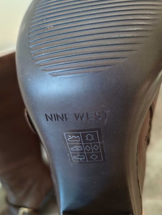 Brązowe skórzane kozaki na obcasie Nine West rozm.39