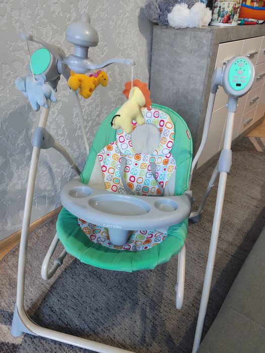 Заколисуючий центр, качеля гойдалка, шезлонг.