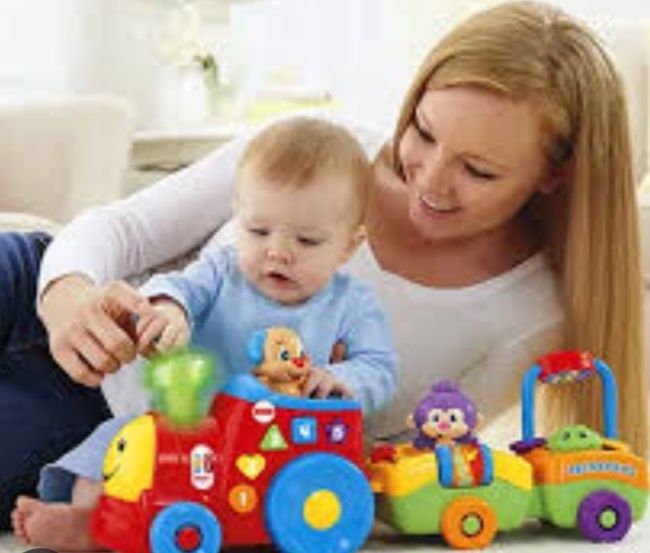 Развивающая игрушка "Поезд умного щенка" от бренда  Fisher Price