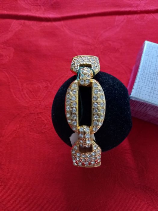Pulseira dourada com brilhantes  marca Shock