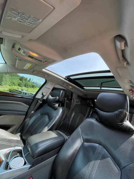 Cadillac srx 2011 року