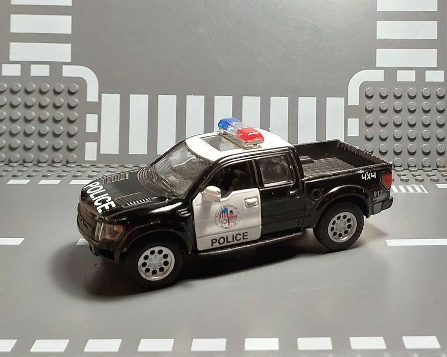 Ford F-150 SVT Raptor поліцейська (ВЖЕ БЕЗ КОМІСІЇ) масштаб 1:46