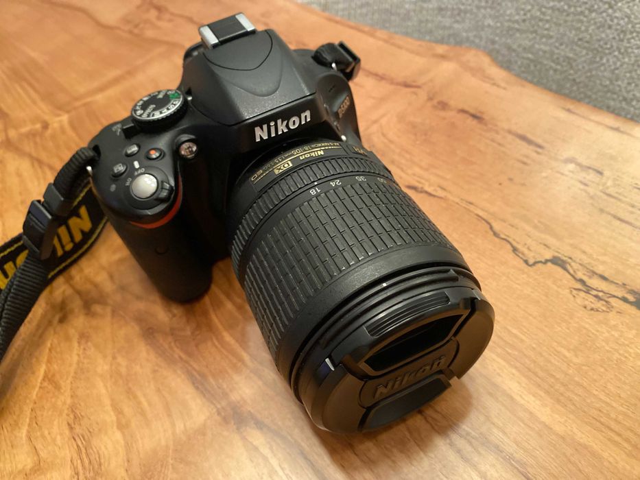 Máquina fotográfica Nikon D5100 + objectiva 18-105mm + acessórios