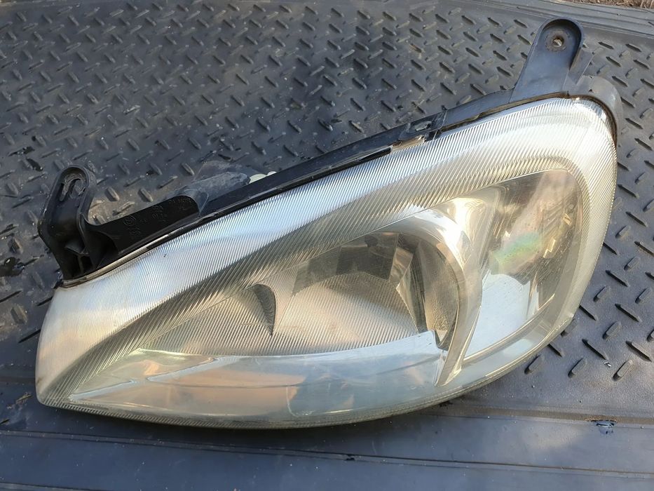 OPEL CORSA C LIFT COMBO C REFLEKTOR LAMPA LEWA LEWY PRZÓD 13195923 VALEO ORYGINAŁ