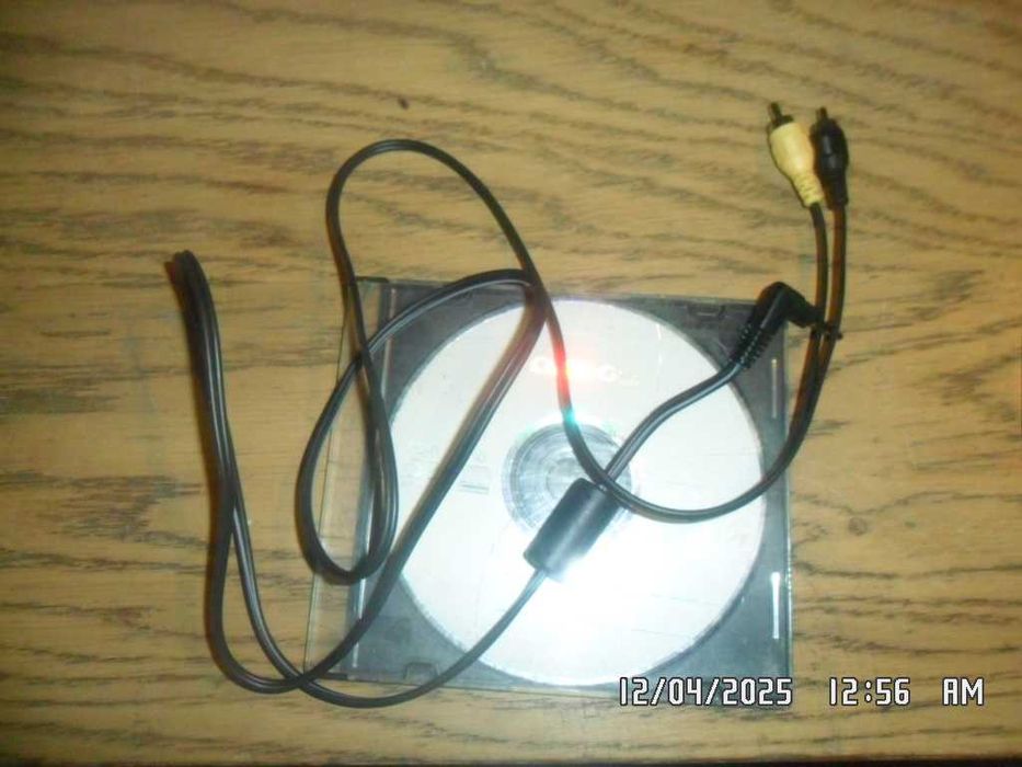 Canon: instrukcja (PowerShot SX100 IS) + kabel ( AVC-D300)