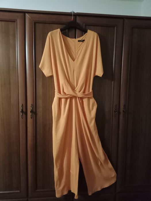 Elegancki damski kombinezon marki Next rozm EU 46.wym w opisie