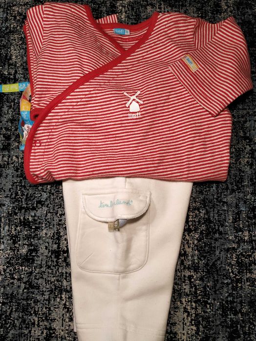 Baby trousers, 6 months old, by Timberland, and pajamas.