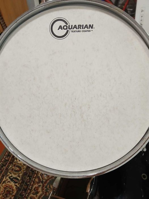 Bateria Fame + 1 par de baquetas