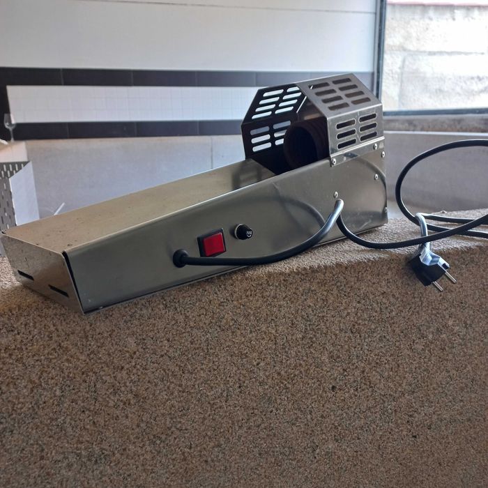 Capsulador térmico de garrafas