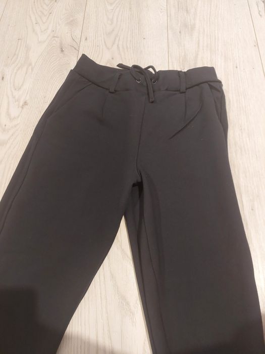 Eleganckie spodnie dla dziewczynki 134 granatowe name it