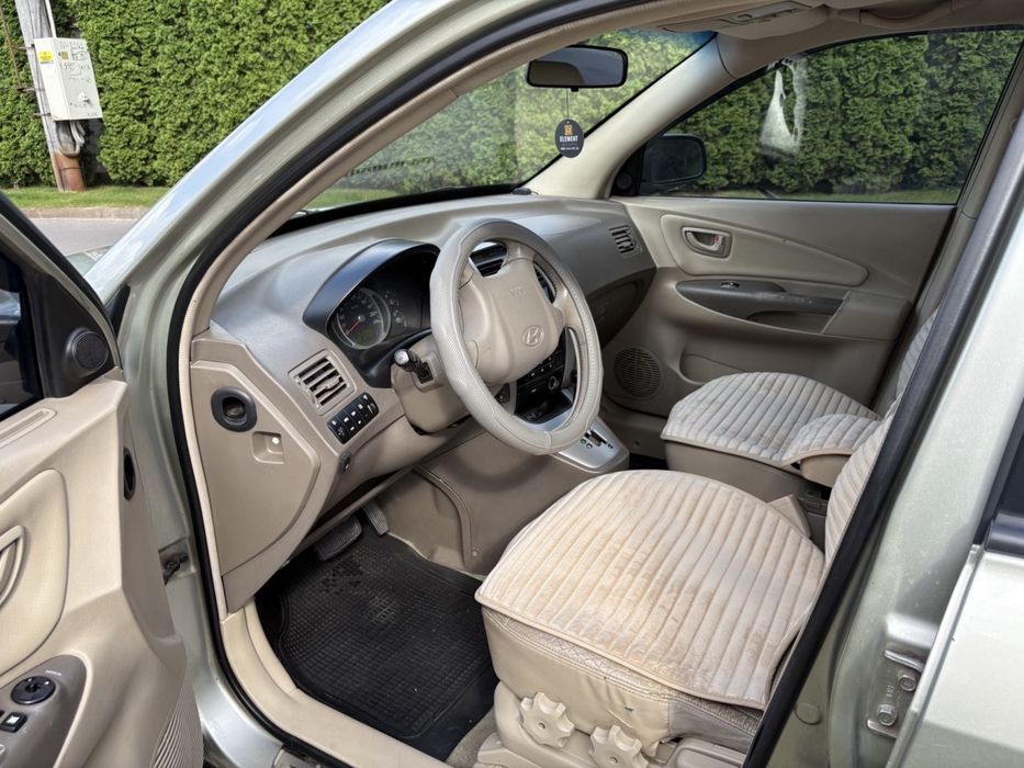 Hyundai Tucson 2006 VIN KMHJN81BP7U556111 фото оголошення 5 з 8