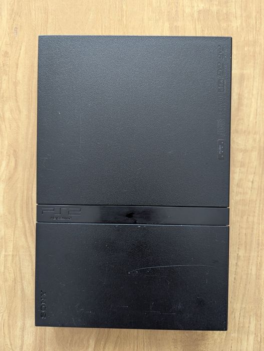 PlayStation 2 Slim + 3 gry